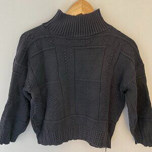 Women's Black Cropped Turtleneck Sweater With Knit Pattern